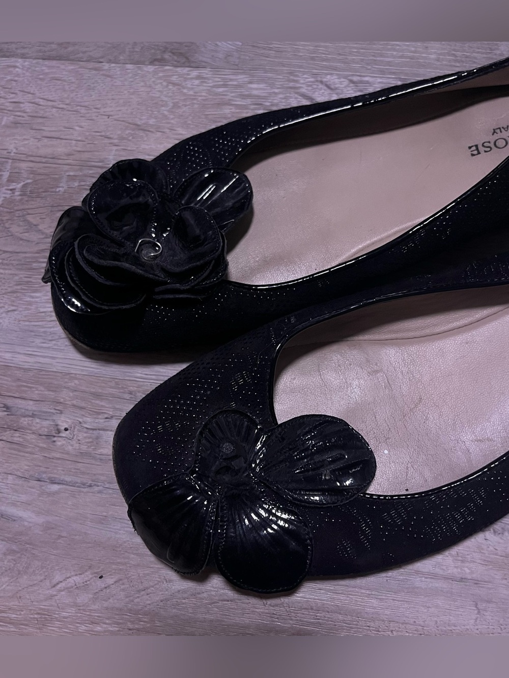 Taryn Rose women’s black ballet flats with floral design